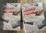 Tampak dua eksemplar buku Kampus Pergerakan: Dinamika Perjuangan Mahasiswa Universitas Janabadra 1986–2026 dengan desain sampul