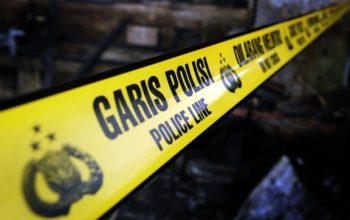 Ilustrasi garis polisi terkait kasus pria tewas diduga akibat penganiayaan di Batuampar, Tanah Laut.