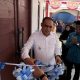 Wakil Bupati Kotabaru Syairi Mukhlis memotong pita saat peresmian Kantor Desa Bungkukan di Kelumpang Barat.
