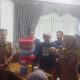 Sosialisasi program BAPILAH di Kotabaru disertai praktik pengolahan sampah organik menjadi kompos.