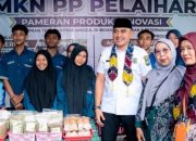Bupati Tanah Laut Rahmat Trianto bersama siswa SMK-PP Pelaihari dalam kegiatan pelepasan murid tahun ajaran 2025/2026.