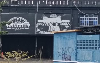 Bangunan ruko dua lantai dengan papan nama Hanghot di depan